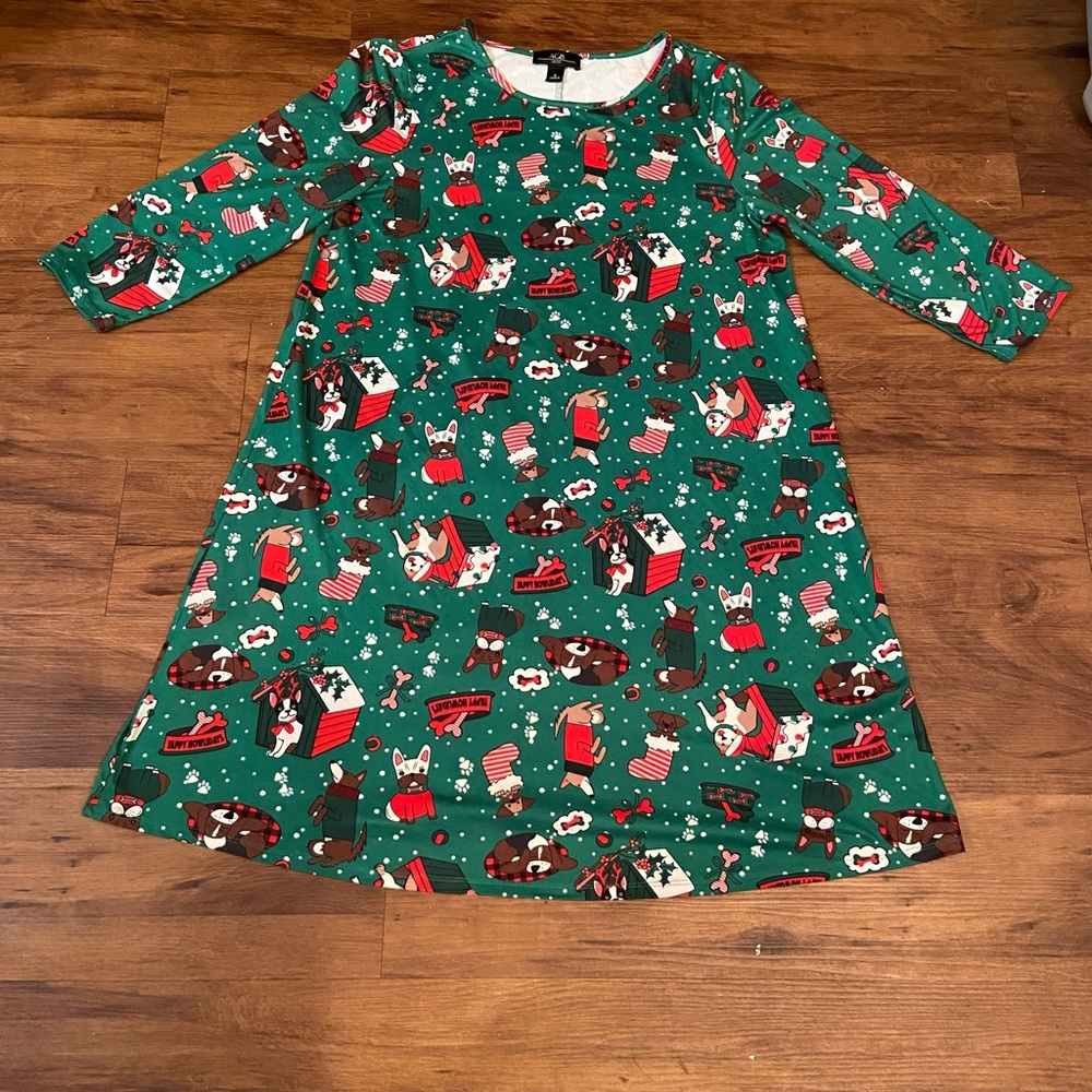 A line Christmas dress with doggies. Sz small poly spandex sooo soft. Length 35”